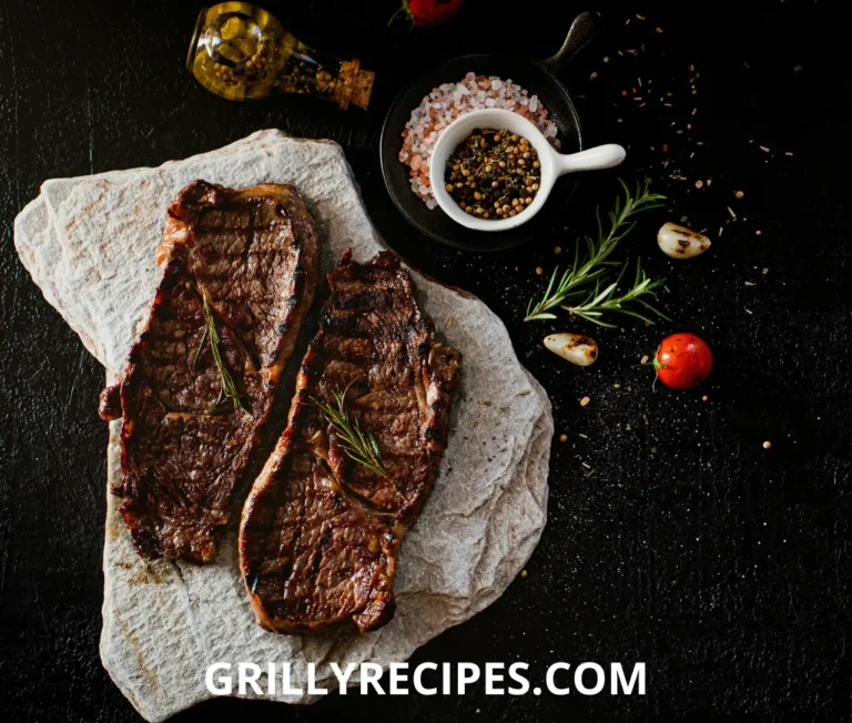 Thin steak cooked to perfection on a hot grill, sliced and ready to serve.
