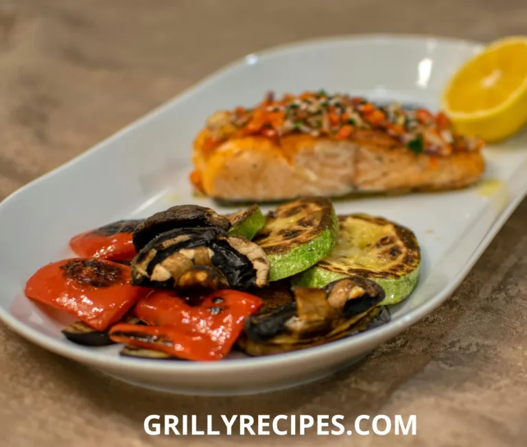 Freshly grilled Coho salmon fillet with a golden-brown crust, garnished with lemon slices and fresh herbs.