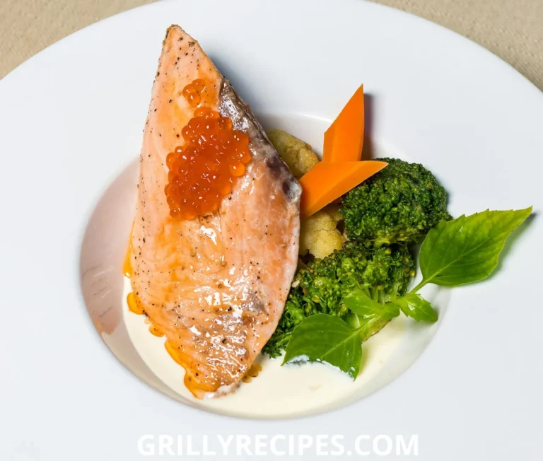 Grilled Cod Recipe with golden grill marks, served with lemon wedges and fresh herbs.