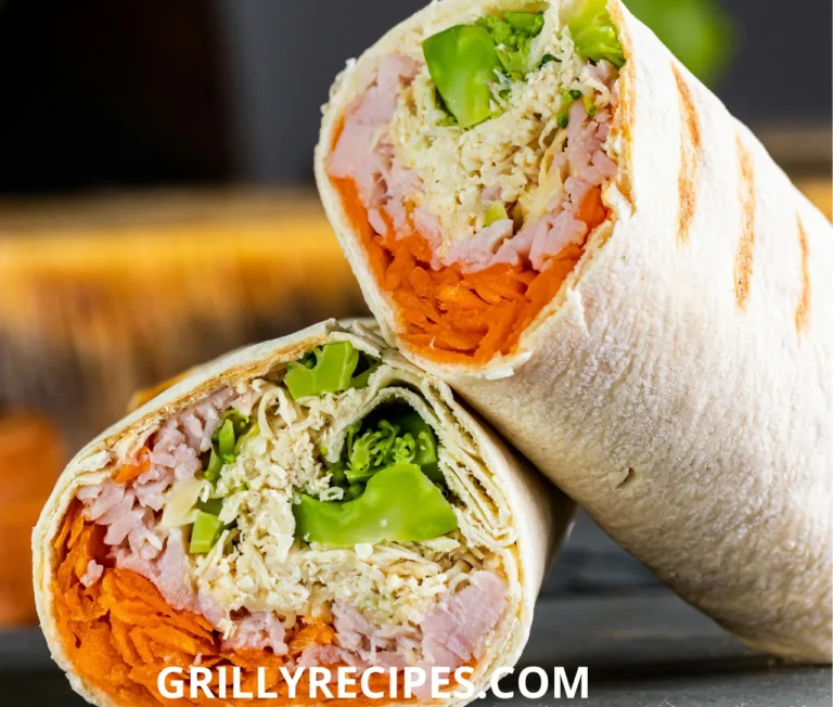 grilled chicken wrap recipe​ and vegetable wrap cut in half, revealing fresh ingredients inside.