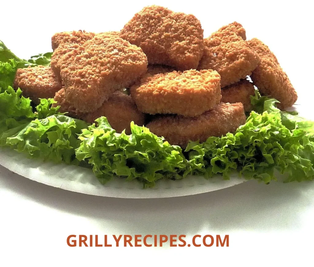 A delicious grilled dish from GrillyRecipes.com, featuring juicy meats and fresh vegetables on a barbecue grill