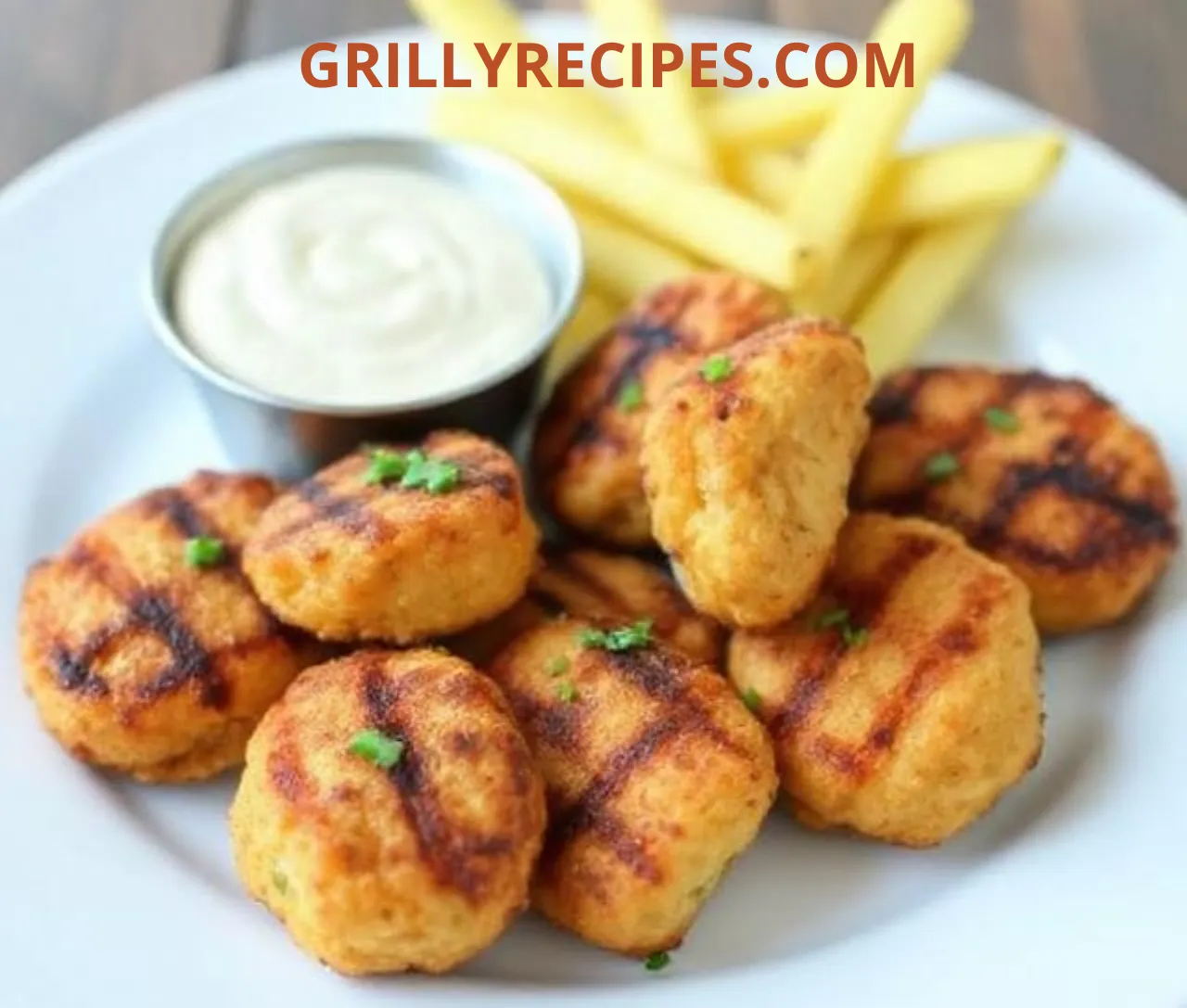 A delicious grilled dish from GrillyRecipes.com, featuring perfectly charred meats and vibrant vegetables on a barbecue grill