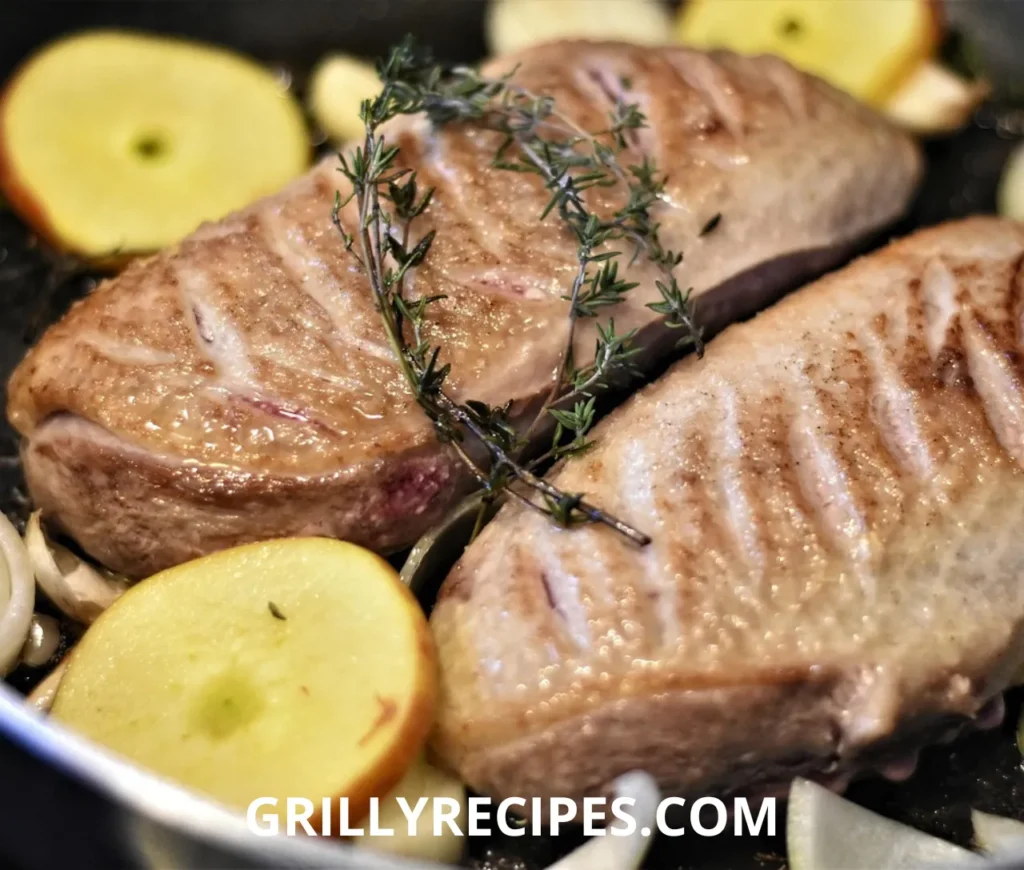 Wood-fired brisket on a Traeger recipes with visible smoke ring and bark